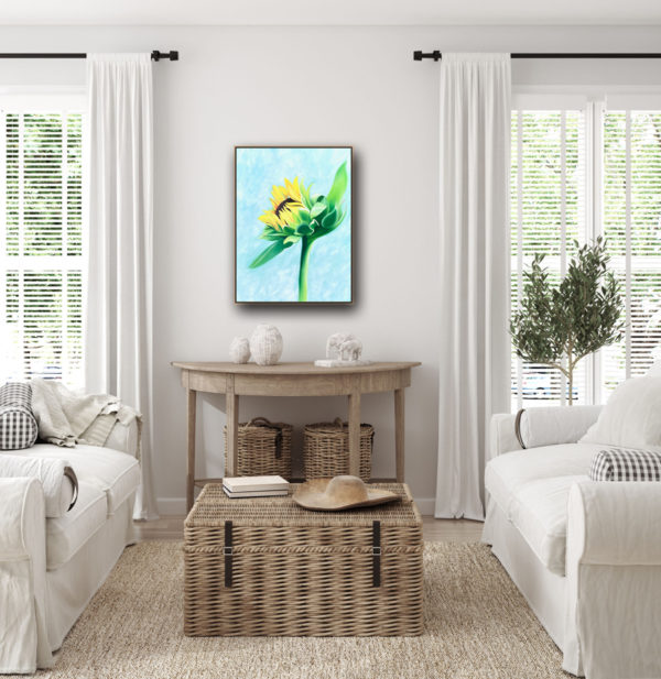 A painting of a single yellow sunflower on a turquoise background for a living room bedroom or kitchen